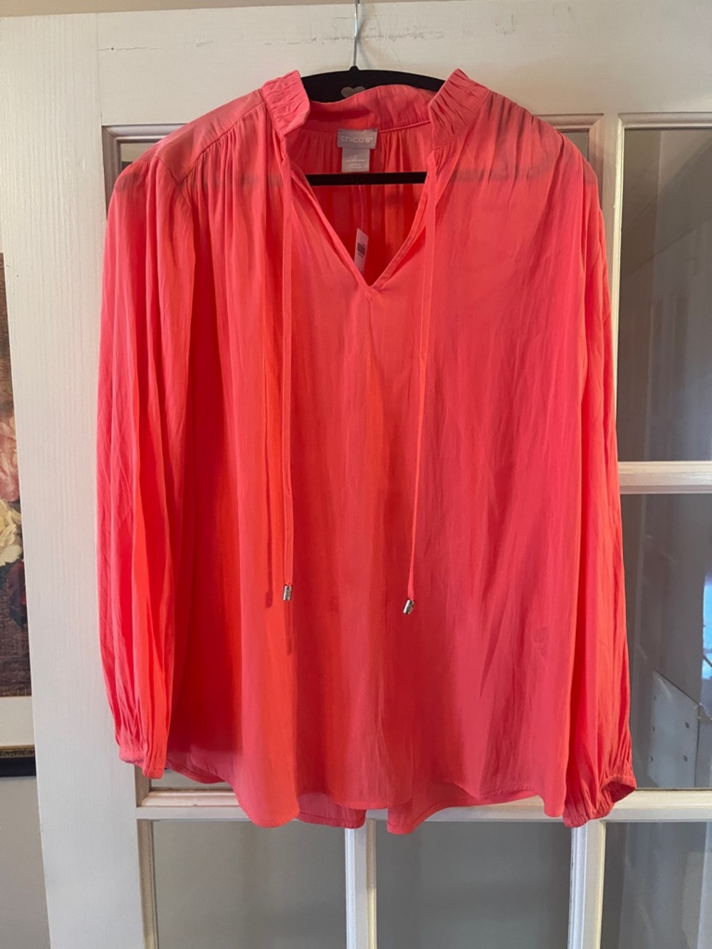 NWT CHICO’s stand neck blouse in Calypso Coral! Chico’s size 2